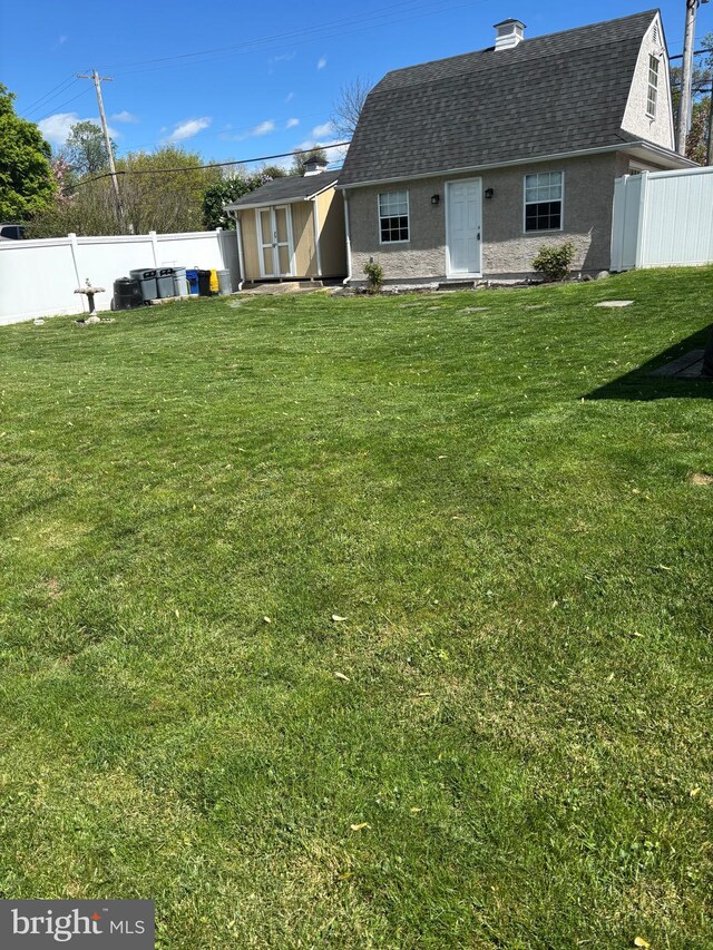 451 Ridge Pike, Lafayette Hill, PA 19444 - back of house featuring roof with shingles