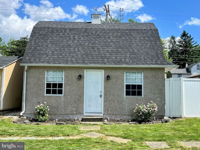 451 Ridge Pike, Lafayette Hill, PA 19444 - view of front of house with roof with shingles, stucco siding, and a chimney