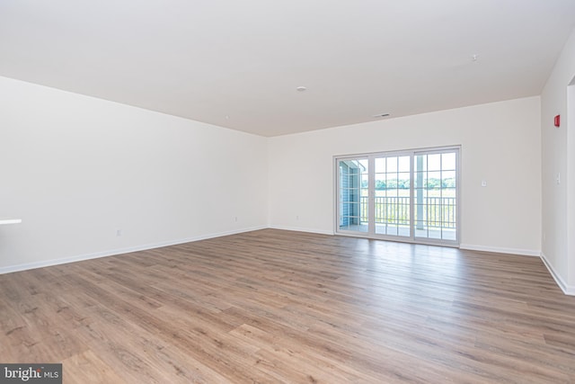 empty room featuring light hardwood / wood-style floors