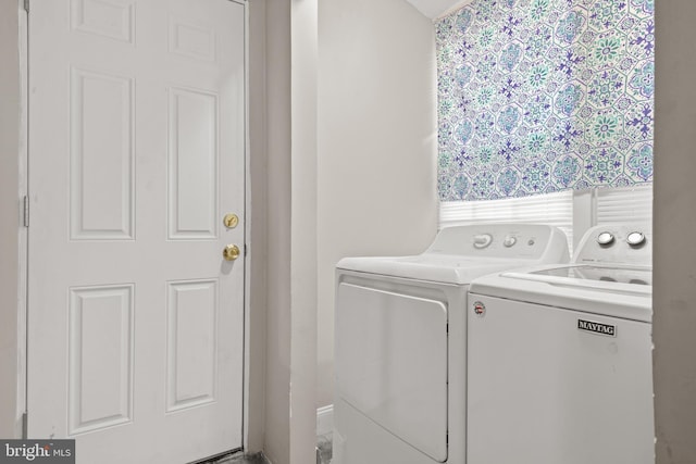 washroom featuring separate washer and dryer