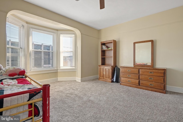 bedroom with ceiling fan and carpet