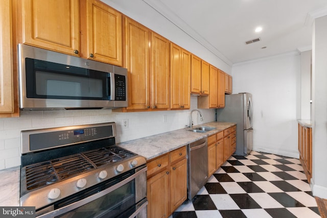 kitchen featuring stainless steel appliances, tasteful backsplash, crown molding, and sink