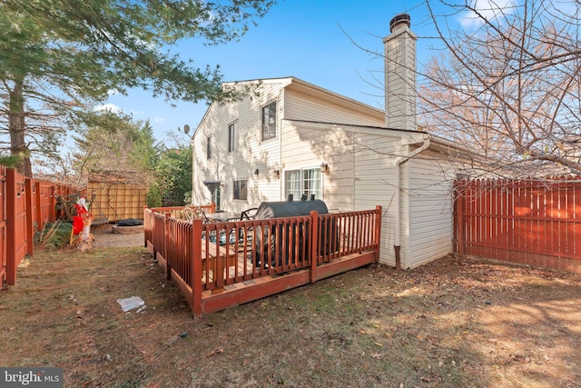 rear view of house with a deck