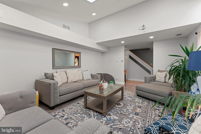 living room with a towering ceiling