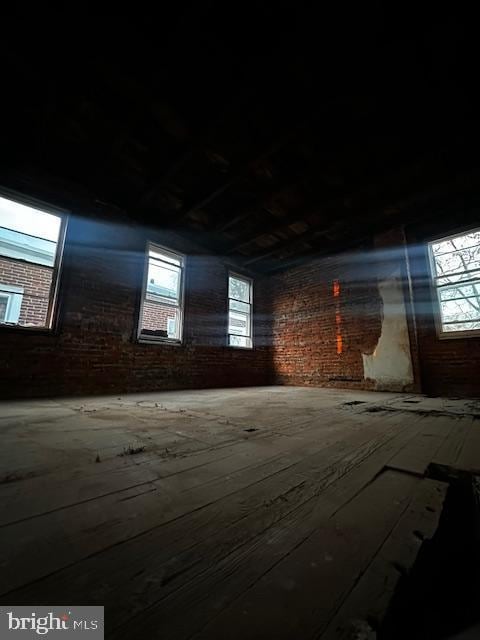 interior space with brick wall