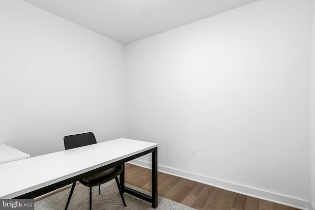 office with hardwood / wood-style flooring