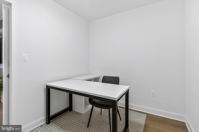 home office featuring hardwood / wood-style flooring