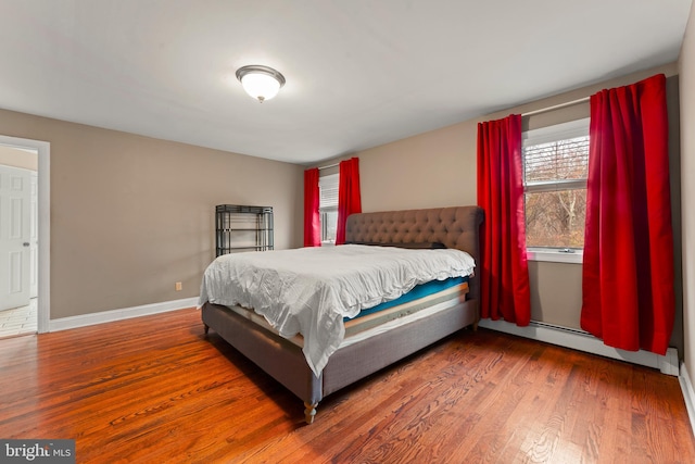 bedroom featuring wood-type flooring