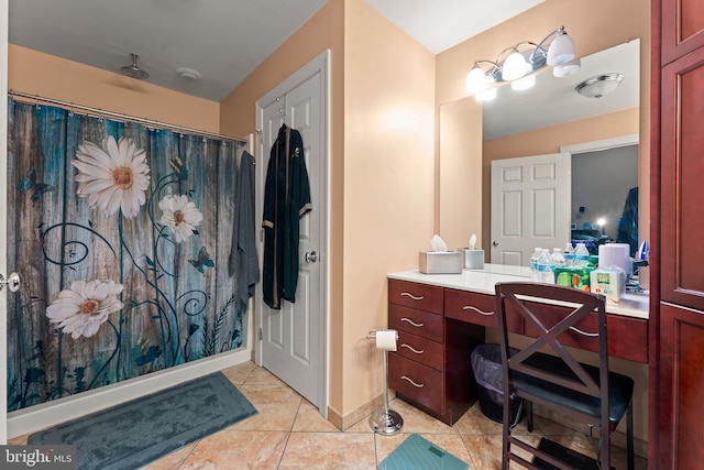 bathroom featuring a shower with shower curtain, vanity, and tile patterned floors