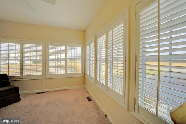 sunroom / solarium with a wealth of natural light