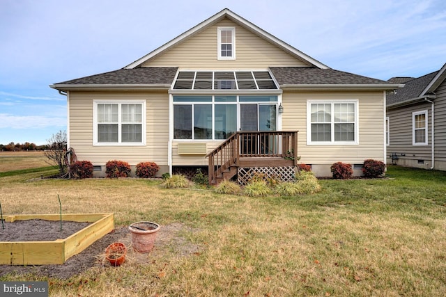 back of house featuring a lawn