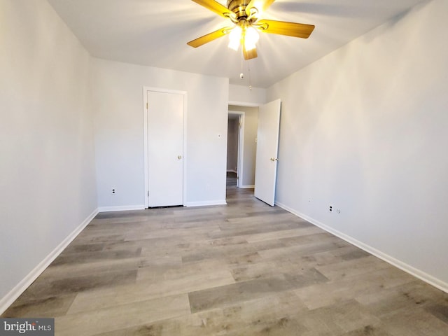 interior space with ceiling fan and light wood-type flooring