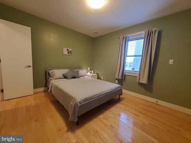 bedroom featuring light wood-type flooring