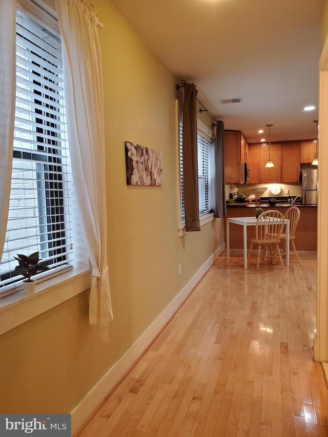 hall featuring light hardwood / wood-style flooring