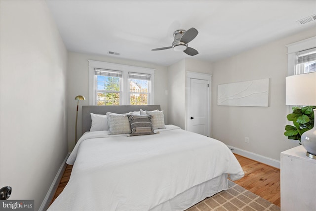 bedroom featuring wood-type flooring and ceiling fan