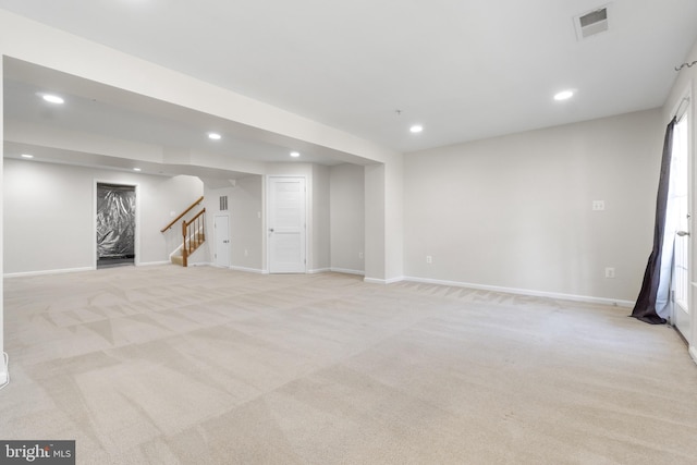 basement with light carpet