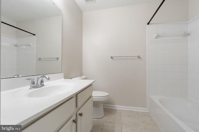 full bathroom with vanity, tiled shower / bath combo, tile patterned floors, and toilet