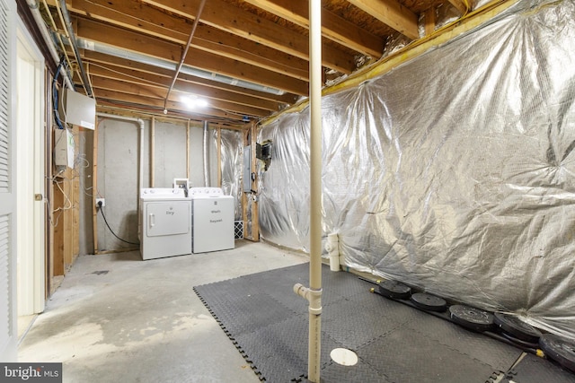 basement featuring washer and clothes dryer