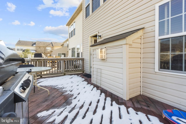 view of snow covered deck