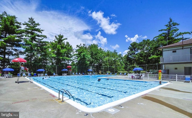 view of pool featuring a patio