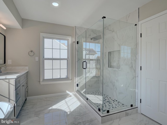 bathroom with vanity and an enclosed shower