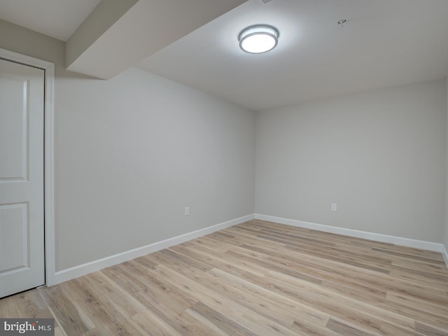 unfurnished room with light hardwood / wood-style floors