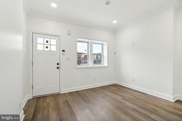 entryway featuring crown molding and dark hardwood / wood-style flooring