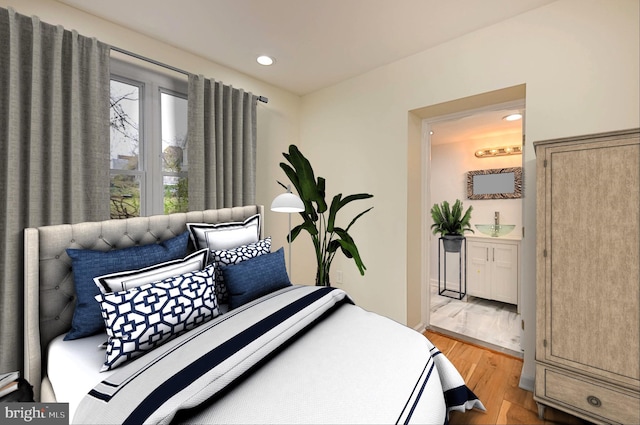 bedroom with light wood-type flooring