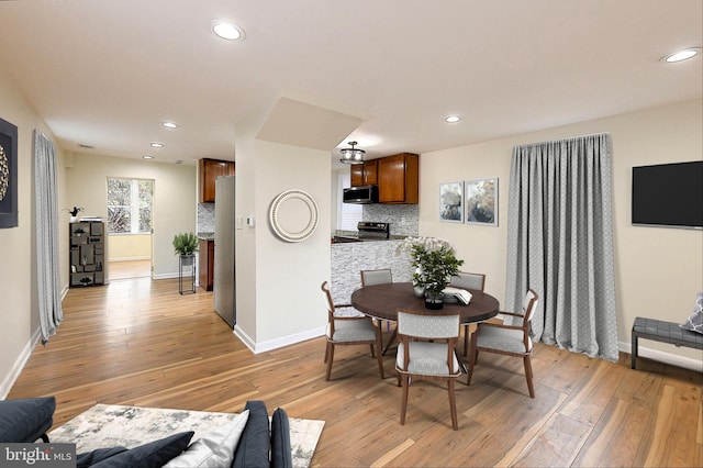 dining area featuring light hardwood / wood-style flooring