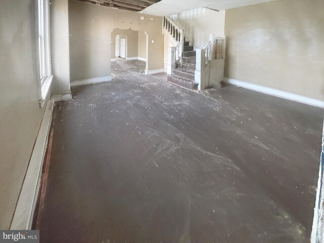 1500 N 56th St, Philadelphia, PA 19131 - basement with arched walkways, stairway, and baseboards