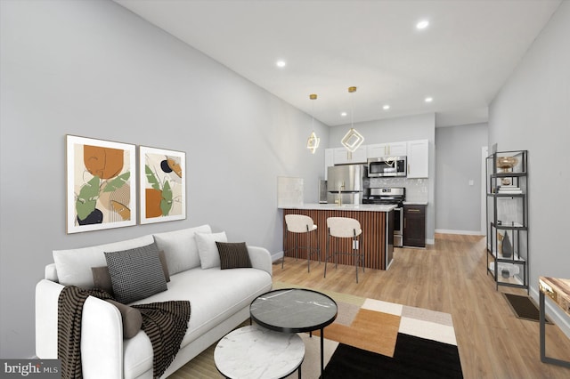 living room featuring light hardwood / wood-style floors