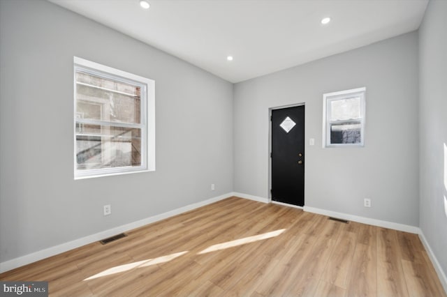 entrance foyer featuring light hardwood / wood-style floors