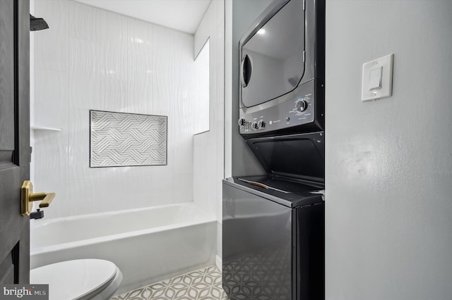 laundry room featuring stacked washing maching and dryer