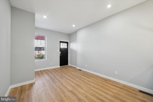 foyer entrance featuring light wood-type flooring