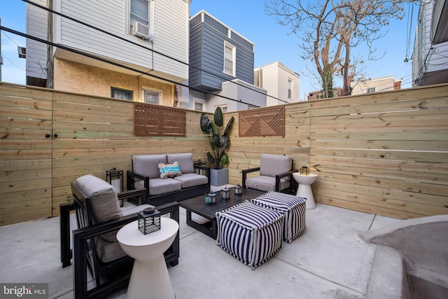 view of patio featuring outdoor lounge area and cooling unit