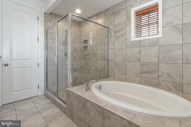 bathroom featuring plus walk in shower