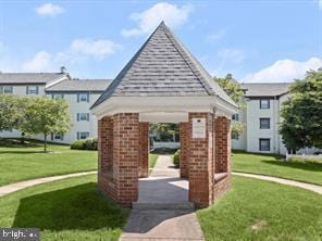 view of community featuring a gazebo and a lawn