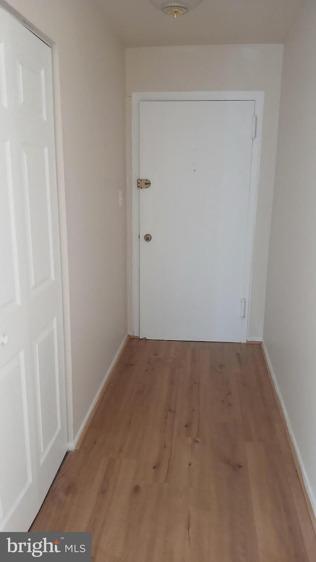 hall featuring light wood-type flooring