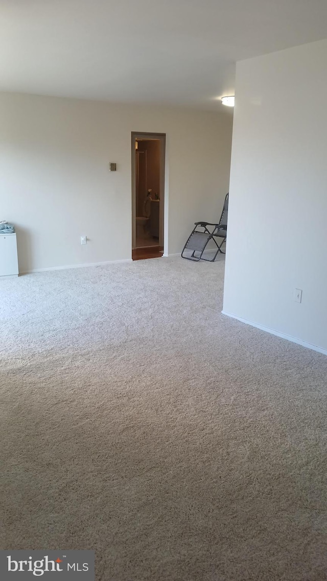 empty room featuring carpet flooring