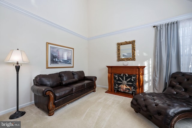 living room featuring light colored carpet and ornamental molding