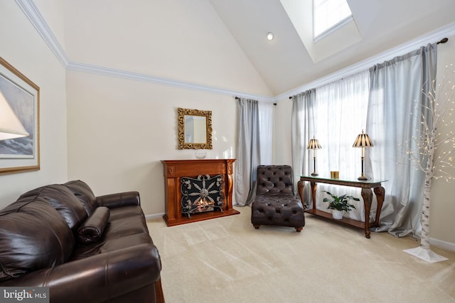 living room featuring carpet, a skylight, high vaulted ceiling, and crown molding