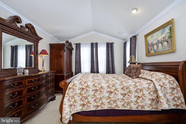 carpeted bedroom featuring vaulted ceiling and ornamental molding