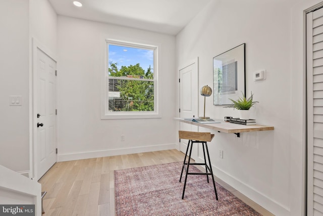 home office featuring light wood-type flooring