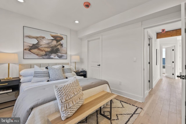 bedroom featuring light wood-type flooring