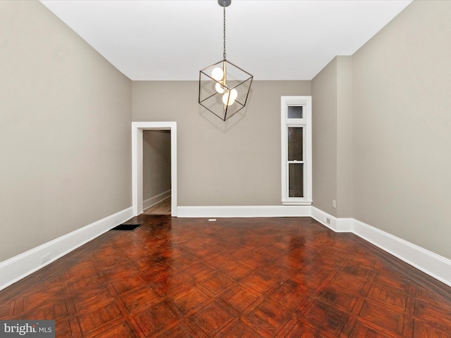 empty room featuring parquet floors