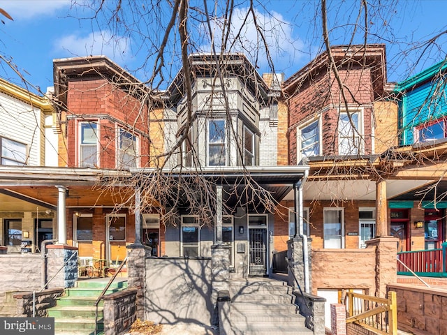 310 E 25th St, Baltimore, MD 21218 - view of front facade featuring brick siding