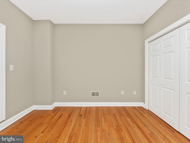 unfurnished bedroom featuring light hardwood / wood-style flooring