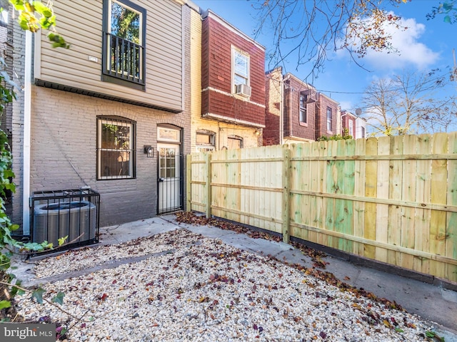 exterior space featuring cooling unit and central AC unit