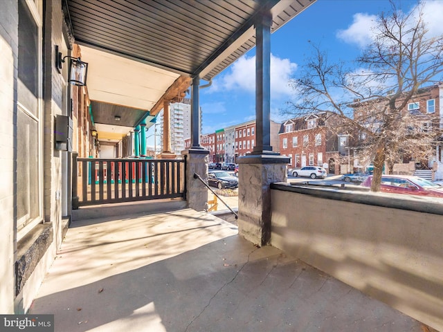 view of patio featuring a porch