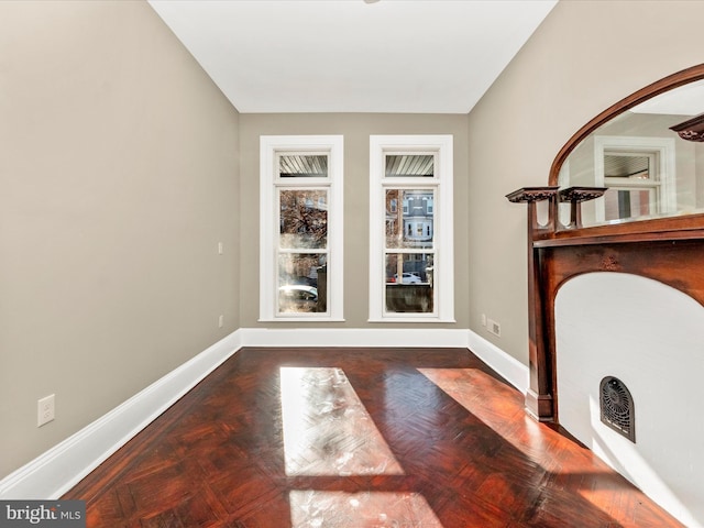 entrance foyer featuring parquet flooring